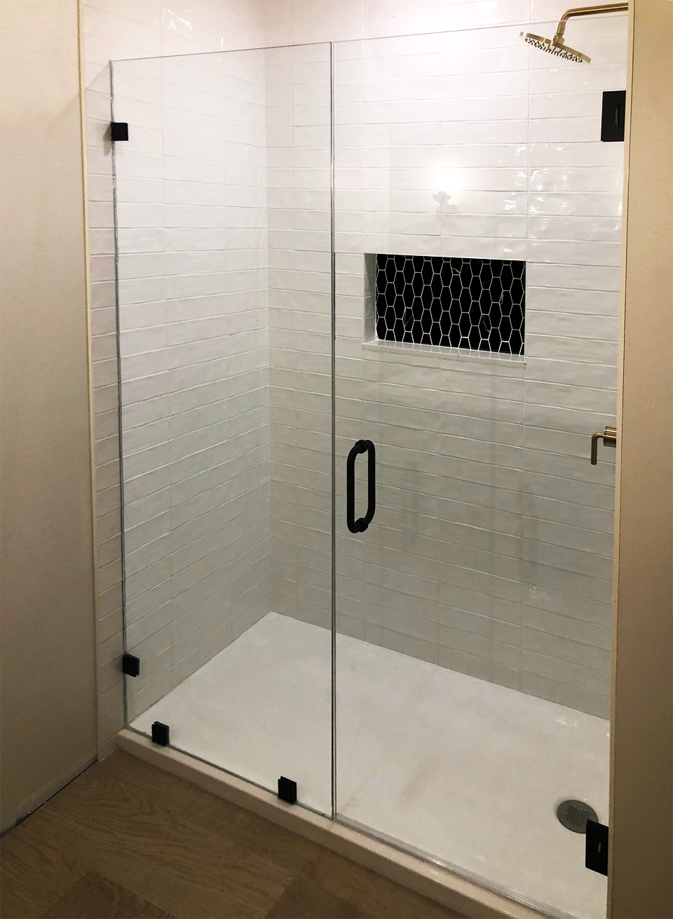 Bath shower with black matte hardware