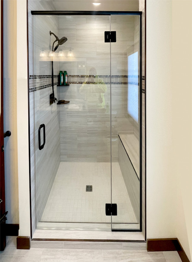 glass shower with black trim